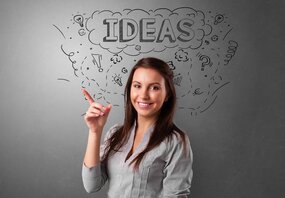 young woman with lots of small business ideas
