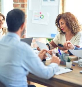 in-person meeting of a franchise leadership team