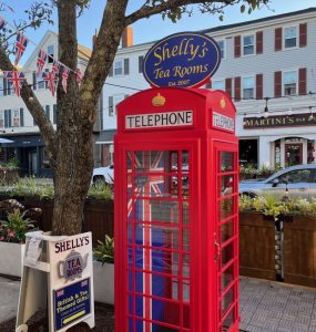 phone booth in front of shelly's tea rooms in plymouth mass
