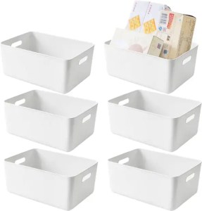 White plastic storage bins for organization and decluttering, perfect for home or office use. Durable, stackable containers for efficient storage solution.
