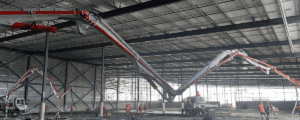 Pumping concrete over extended lengths warehouse internal floor