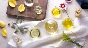 essential oils on a wooden tray