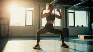 bodyweight circuit workout - energetic burpee position demonstration