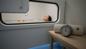 Woman floating in sensory deprivation tank