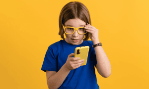 child holding a phone for the trip applications cover