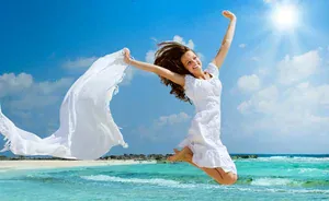 Girl With White Scarf Jumping on The Beach