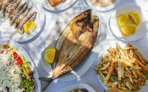 Traditional Greek seafood dish served by the sea in Paros