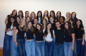 Members of Tonik Tap and Graffiti Dancers pose together wearing jeans.