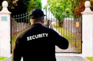 Residential Security Guard In Front Of Security Gate