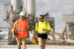 Industrial engineer in a safety helmet on site