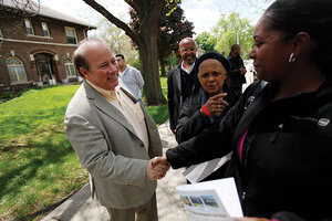 Duggan greets people