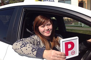 A D-Tech driving school vehicle preparing a student on an actual route circuit in the Hills District.