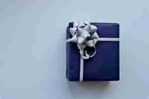a blue gift box signifying the gifts of being an empath. Looking for a way to navigate the unique challenges of empaths? Our anxiety therapists can help feel less anxious. Call today!