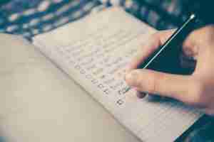 A handwritten to-do list packed with tasks, a pattern that ptsd therapy in Michigan connects to childhood trauma and perfectionism.