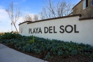 Entrance monument sign for the Playa Del Sol resort-style gated community in San Diego
