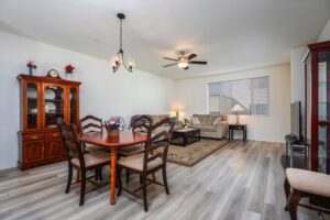 View of the spacious dining and living room at 5235 Beachfront Cove Unit 102