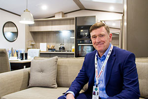 Gary Corlyon inside the Victory Leisure Homes new model – Lakewood Lodge