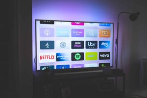 A television showing various streaming services available for watching.