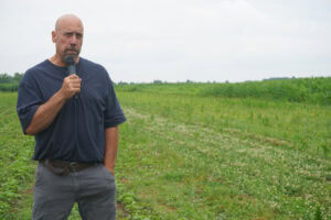 Local grain grower and active cover cropper Woody Van Arkel showed how he uses the RoamIO HC to mow perennial cover between crop rows. - Photo: Matt McIntosh