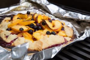 grilled peach and blueberry galette, via www.goodfoodstories.com