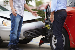 two-guys-crash-gray-and-red-cars