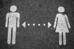 A male and female stick figure side by side, representing therapist gender options in men's counseling in Detroit, MI