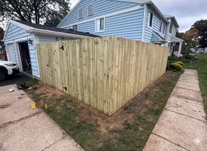 Replaced a fence for a client with a dogeared wood fence.