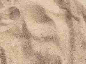 picture of sand representing an example of the EMDR calm safe place exercise. Start EMDR therapy in Ann Arbor or Detroit today!