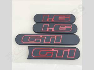 Ensemble de 4 enjoliveurs 1.6 GTI Gris Anthracite en relief