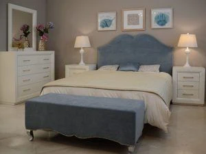 Dormitorio matrimonio cabecero tapizado con tachuelas