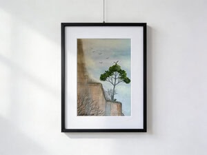 Watercolor by Gordana Majic featuring a solitary tree in a small oasis on a rock face, birds in flight in a desert valley, 30 x 40 cm with mat