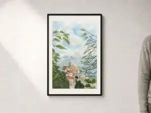 Acquerello colorato della Chiesa Madonna del Sasso sopra Locarno, incorniciata da alberi e rami con montagne azzurre sullo sfondo, presentato con passepartout e cornice nera; dimensioni esterne 52 × 72 cm.
