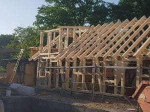 Holzrahmenbau im Bau, nachhaltiges Baukonzept, Holzhaus in der Entstehung, ökologische Bauweise, Holzbauarbeiten auf dem Wellnesshof RaJa.