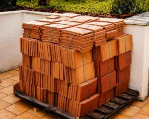 Pallet of stacked roofing material ready for installation