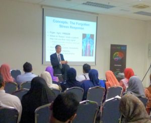 Bill Frost - Hypnotherapy, NLP and EMDR Lecturer & Therapist teaching an group of medical students