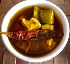 One must-have or rather ‘easy-to-have’ in kitchens is the simple aam tel (sun-dried mangoes preserved in pure mustard oil with spices).