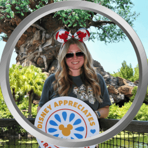 Enjoying a fun day at Disney's Animal Kingdom with themed accessories and a cheerful smile.