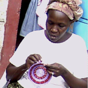 Kenya beaded wire basket weaver