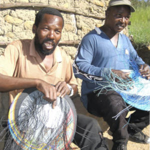 Zulu wire basket weavers. African basket weavers preserve their cultural heritage while they support themselves and their families.