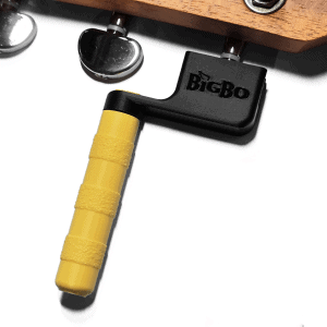 Guitar string winder in black and yellow winding guitar strings