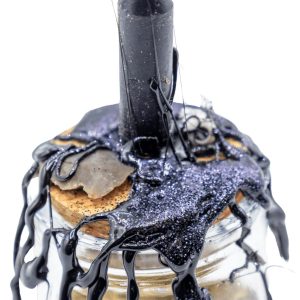 Protection Spell Jar - Large, handmade magical jar with a black candle, herbs, and a black wax seal, designed for protection and warding off negative energy.
