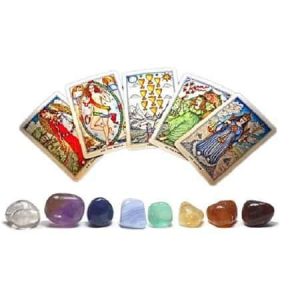 Crystal Tarot Set, a collection of tarot cards with detailed illustrations and colorful gemstone crystals arranged in front of the cards.