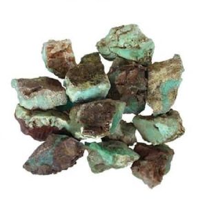 Chrysoprase Rough, green gemstone in its natural, unpolished form with an uneven texture.