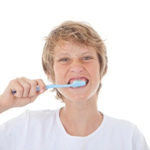 child brushing teeth