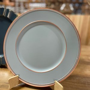 Sousplat cinza e cobre