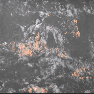 Close-up texture of Clayton Brown glossy vitrified tiles