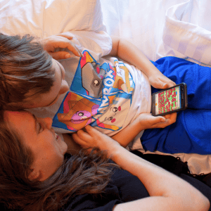 mom and son looking at GoWhee, the travel app to find fun things to do with with kids near me