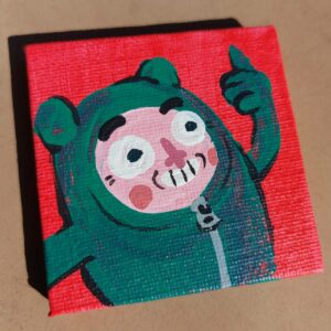 This Patuti™ pal is pretty pleased. Green on red.