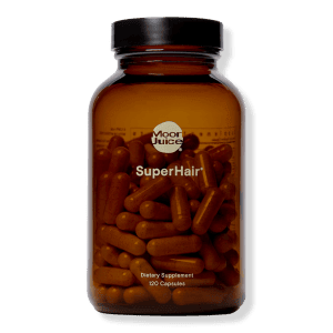 Bottle of moon juice superhair supplements - beauty habits