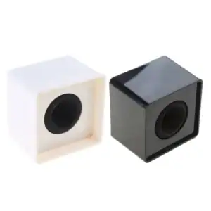 Two blank square plastic microphone flags (mic cubes), one white and one black, shown on a white background with round foam inserts for gripping a handheld microphone.
